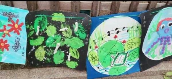 姥姥在自家院子为6岁外孙办画展